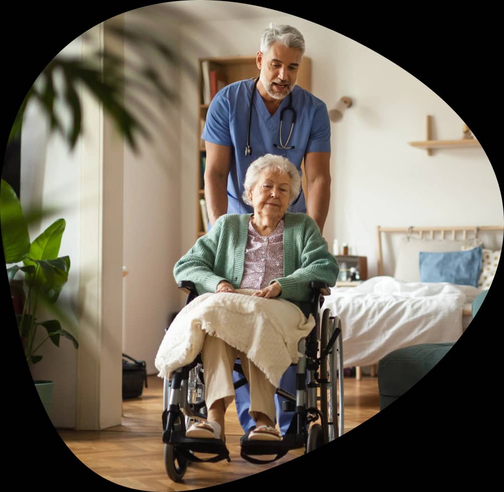 A nurse supporting an older adult receiving care at home